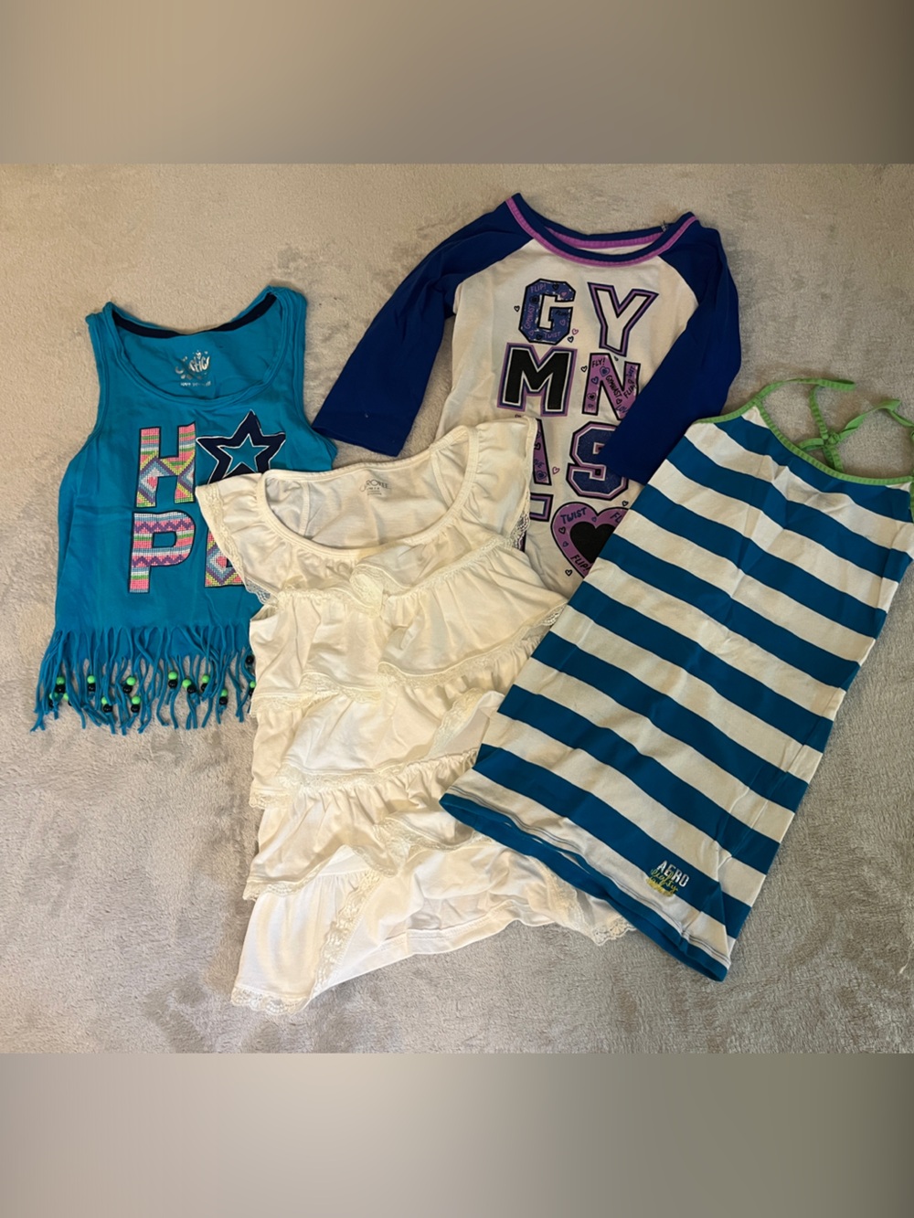 Bundle of 4 Girls summer shirt by aero- justice and Cherokee - size 7/8